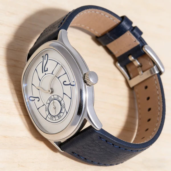 Side view of the silver Tiziano showing the crown, case profile and steel pin buckle