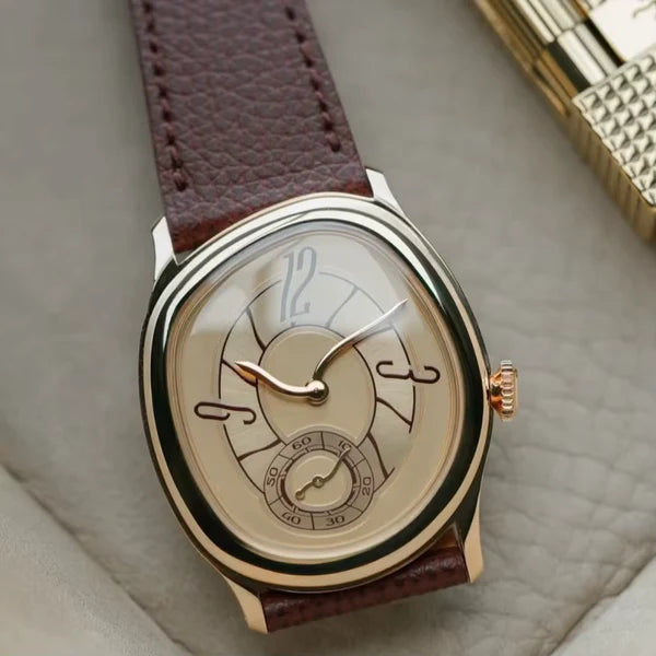 Top view of the rose gold tone Tiziano with cream dial on a burgundy brown leather strap