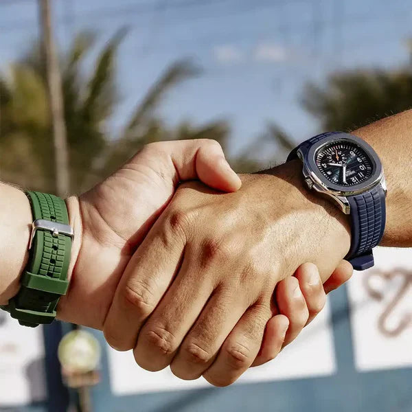 Two men shaking hands, one wearing the Portofino in green and the other in blue