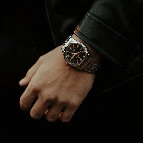 Men's two-tone day-date dress watch photographed on the wrist