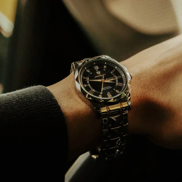 Romano day-date watch resting beside its Vanetto presentation box