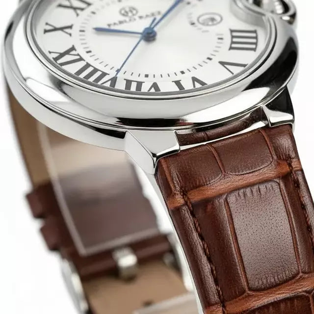 Close view of the Siena's domed steel case profile against the brown leather strap