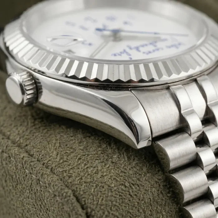 Sprezzatura automatic watch crown and steel Jubilee bracelet detail